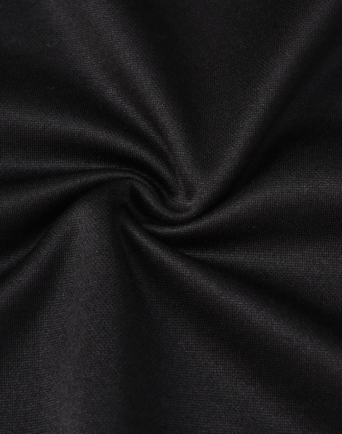 A close-up of black fabric, featuring a smooth texture with a slight stretch, suitable for polo shirts.