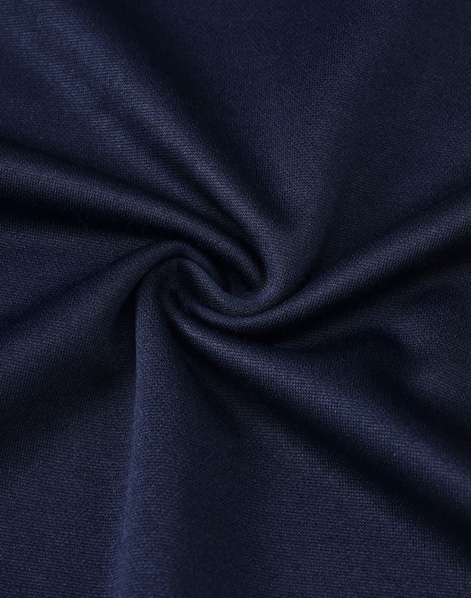 A fabric swirl in a deep navy colour, showcasing a soft poly/cotton blend. Ideal for polo shirts.