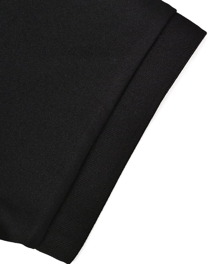 A close-up of a black sustainable poly/cotton polo shirt sleeve with a textured cuff and branding.