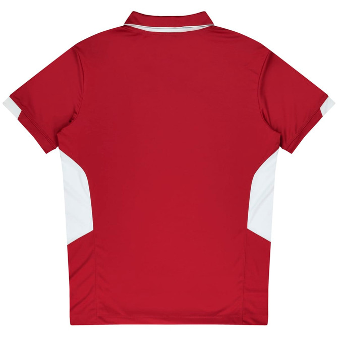 A red polo shirt with white accents on the sides and a collar. The shirt has a logo on it.