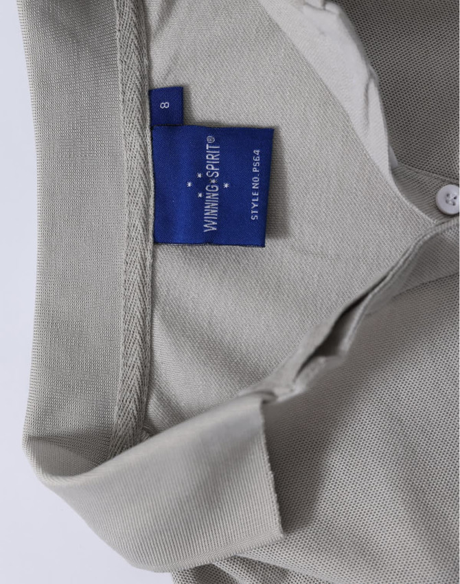 A grey Ladies' Truedry Pique Polo with a collar and buttons, featuring a logo tag inside the neckline.