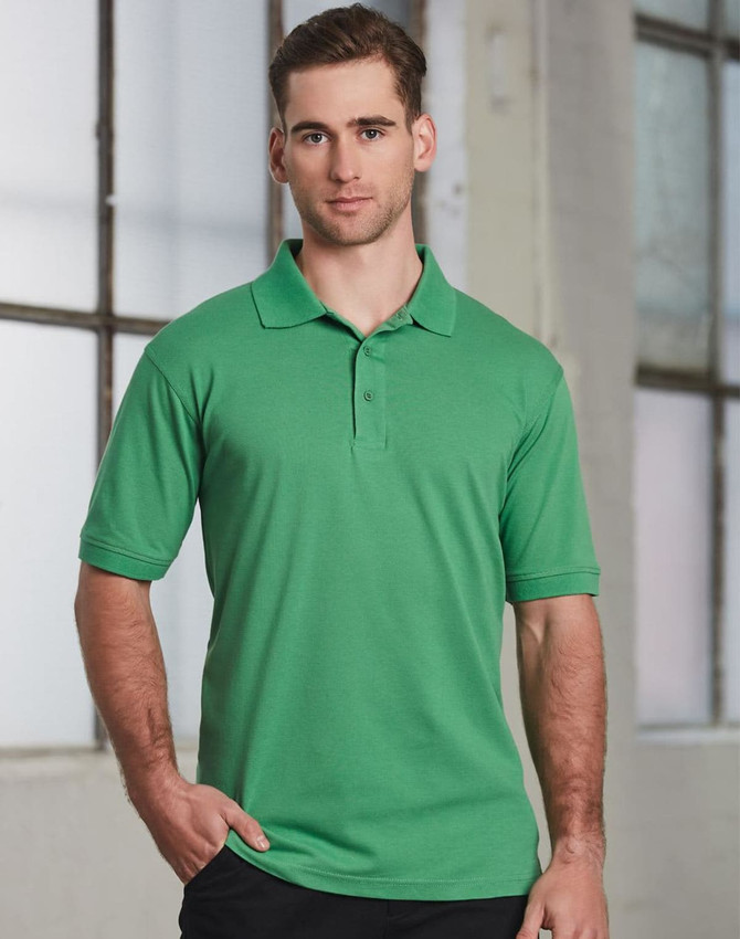 A green polo shirt with a collar, featuring short sleeves and a logo on the chest.