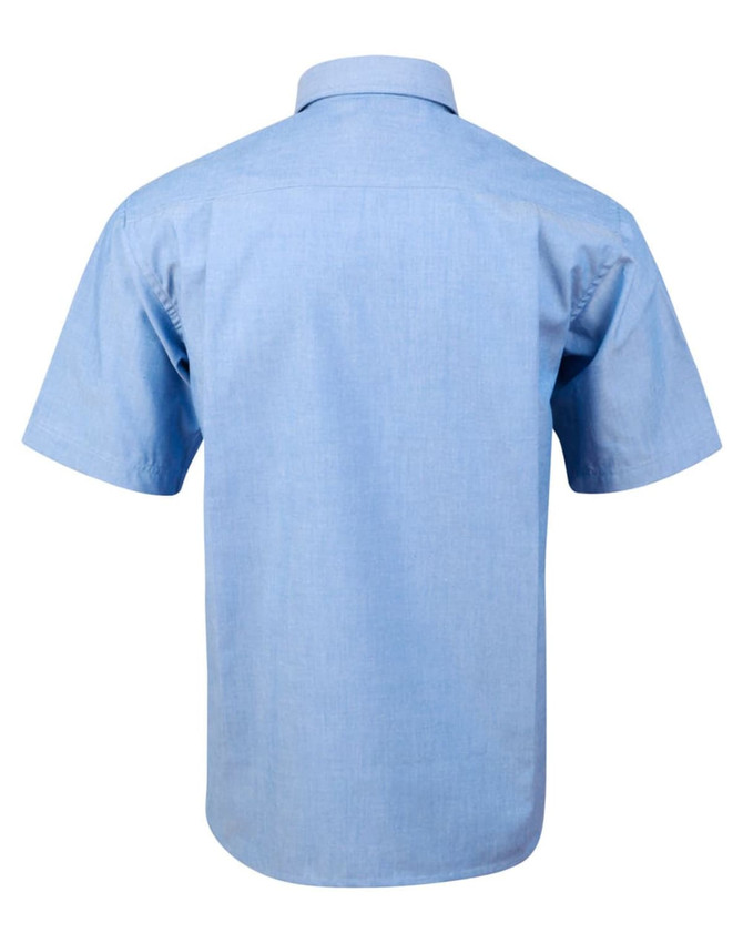 A light blue men's chambray short sleeve shirt with a collar and a logo on the back.