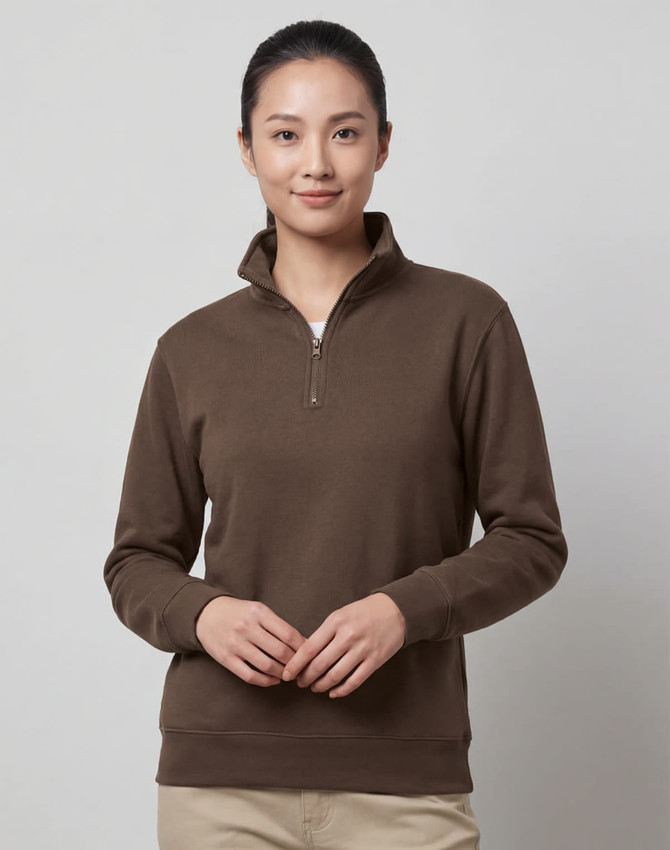 A brown 1/2 zip collar fleece jumper featuring a zip at the neckline and long sleeves. It has a logo on it.