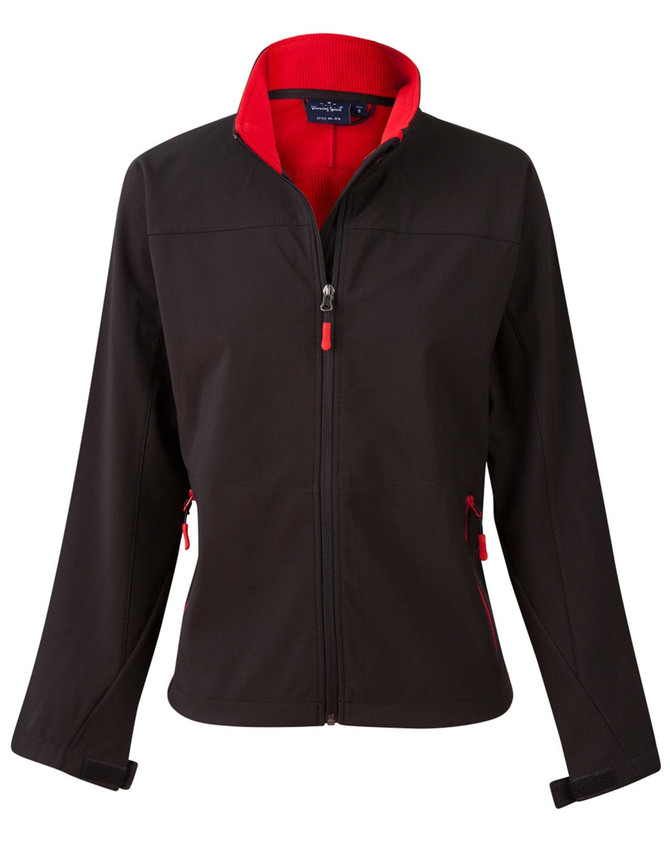 A ladies' softshell jacket in black with red contrast detailing and a zip front. It features side pockets and a collar.