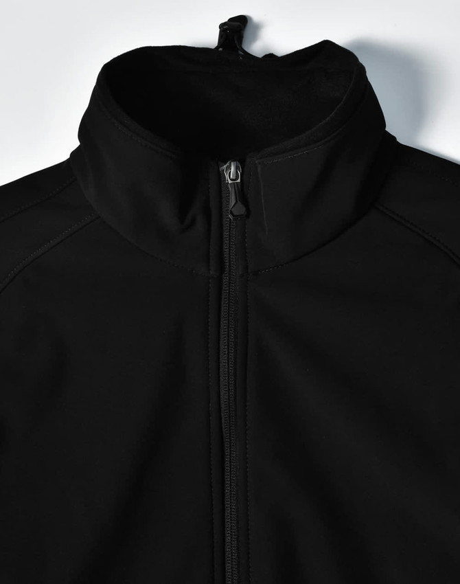 A black men's softshell high-tech jacket with a high collar and zip fastening, featuring a logo.