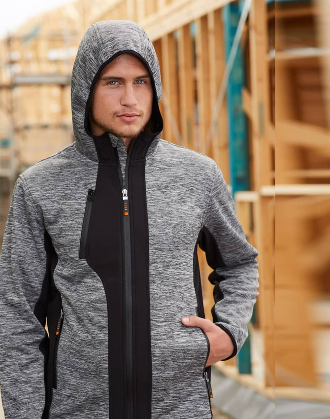 A grey and black zip-up workwear jacket with a hood, featuring a subtle texture and a logo.
