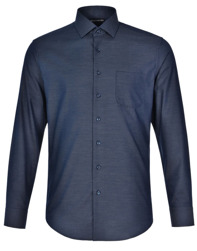 A men's long-sleeve shirt in navy blue with a pin dot pattern and a single chest pocket.