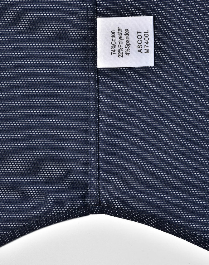 Men's long sleeve button-up shirt in navy with a pin dot pattern, featuring a label.
