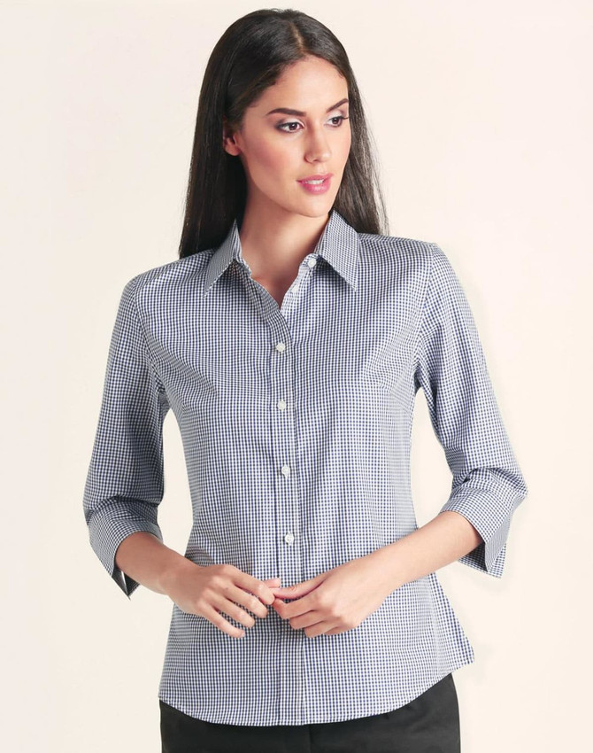 A women’s button-up shirt featuring a two-tone check pattern in navy and white, with 3/4 sleeves and a collar.