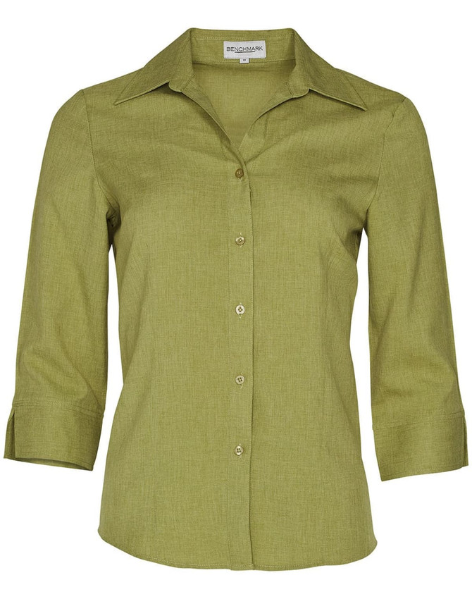 A women's green 3/4 sleeve shirt with a button-up front and a collar, featuring a logo on the label.