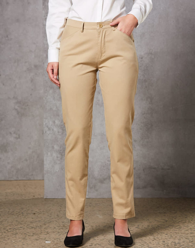 Ladies' Boston Chino Pants in beige, featuring a fitted style with pockets, modelled against a neutral backdrop.