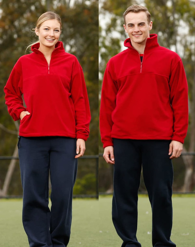 A red unisex polar fleece jumper with a half-zip collar, displayed on both a male and female model.