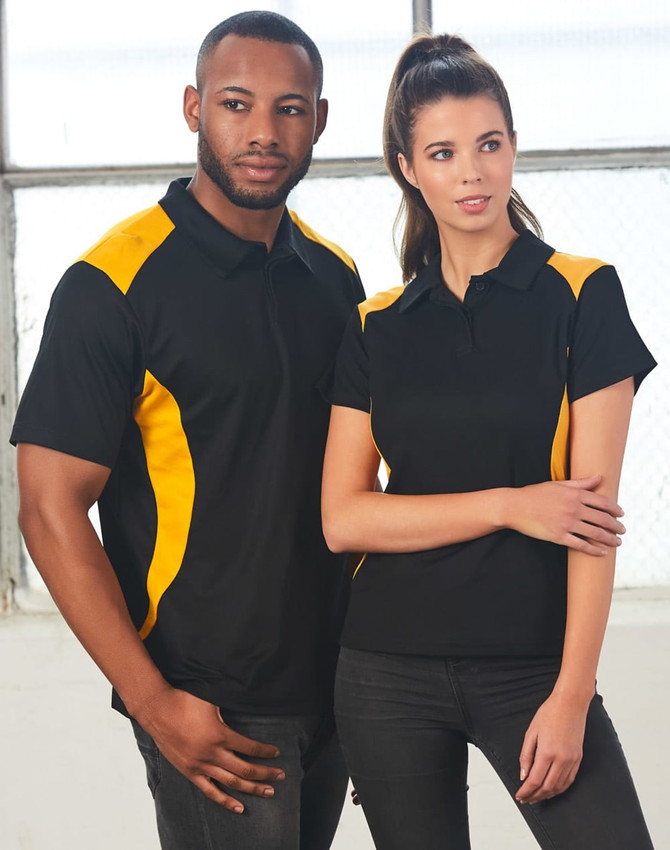A black polo shirt with yellow accents, featuring a logo, modelled by a man and a woman.
