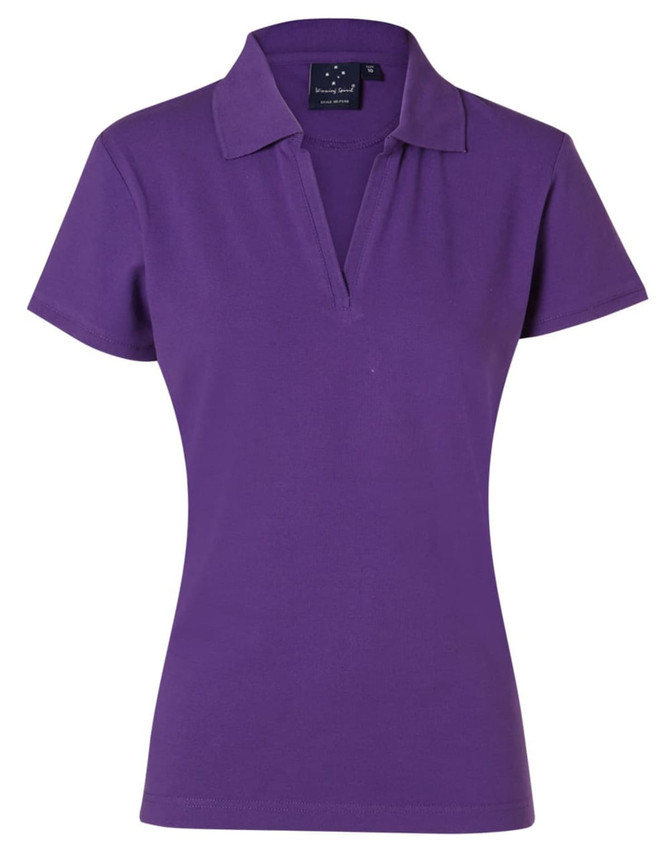 A purple ladies' polo shirt with a collared neckline and short sleeves, featuring a logo on the front.