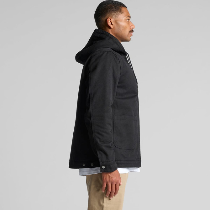A black canvas heavy hooded jacket featuring a front pocket and a logo. Displayed on a model in profile view.