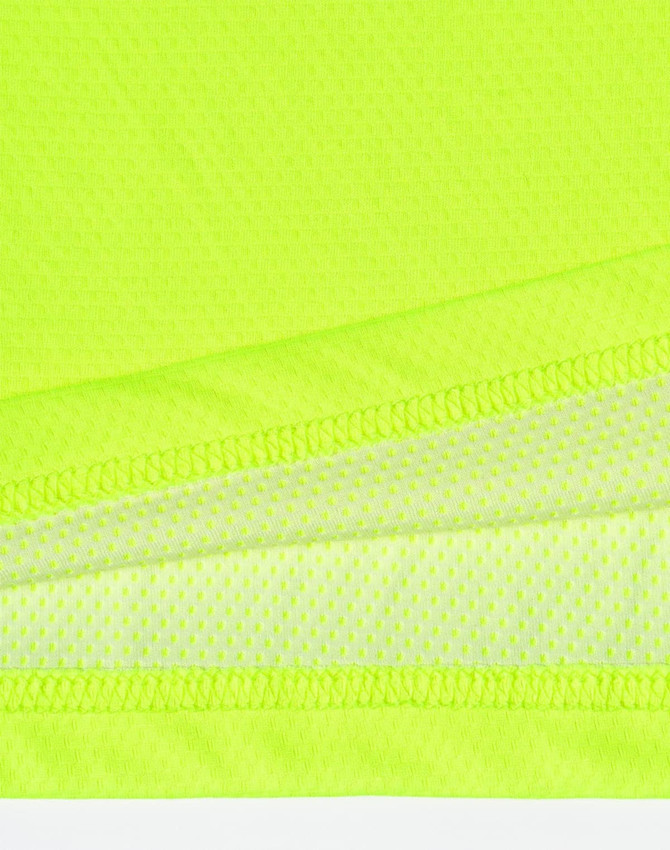 A bright yellow high-visibility polo shirt featuring vented sections and a breathable fabric texture.