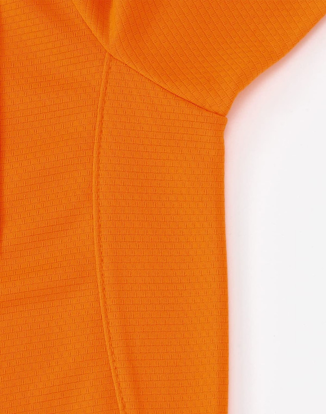 An orange short-sleeved polo shirt made from bamboo charcoal material, featuring a subtle textured pattern.