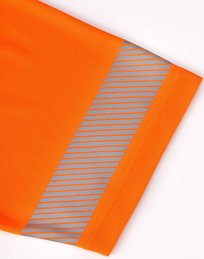 An orange polo shirt featuring segmented reflective detailing along the sleeve. It has a logo on the fabric.