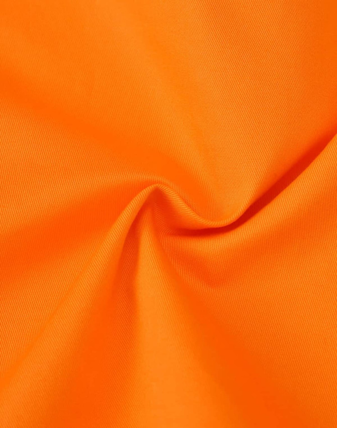 An orange fabric, showcasing a smooth texture with a slight sheen, suitable for workwear applications.
