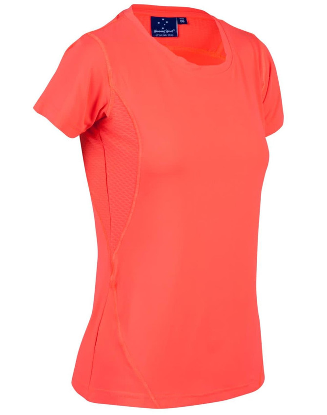 A bright coral ladies' t-shirt featuring a fitted design and breathable fabric with a logo on the label.