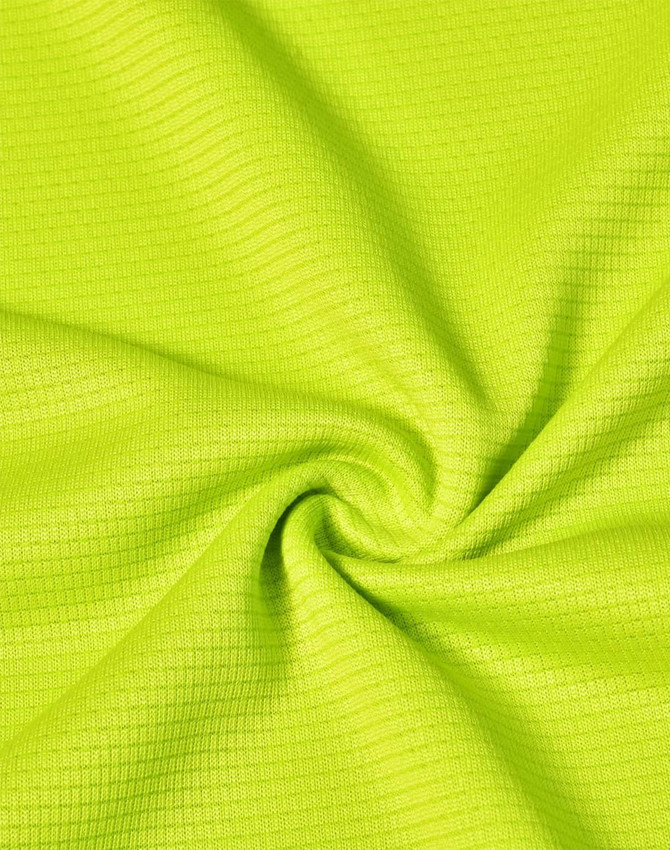A close-up of lightweight, textured fabric in vibrant lime green, suitable for performance t-shirts.
