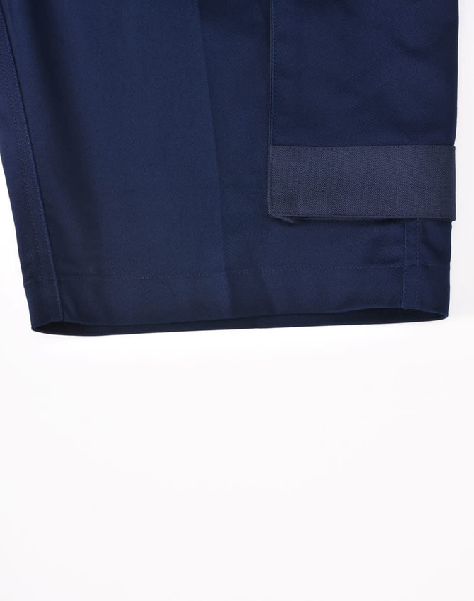 Navy blue unisex utility stretch cargo work shorts with a cuffed hem and branding.