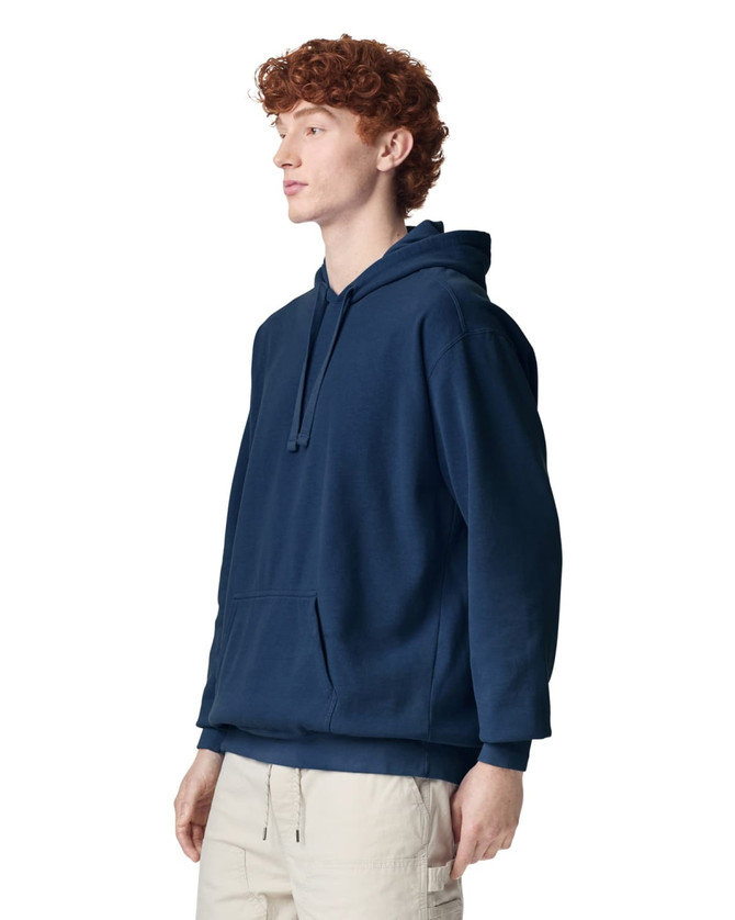 A navy hooded sweatshirt with a front pocket, showcasing a simple design and a relaxed fit.