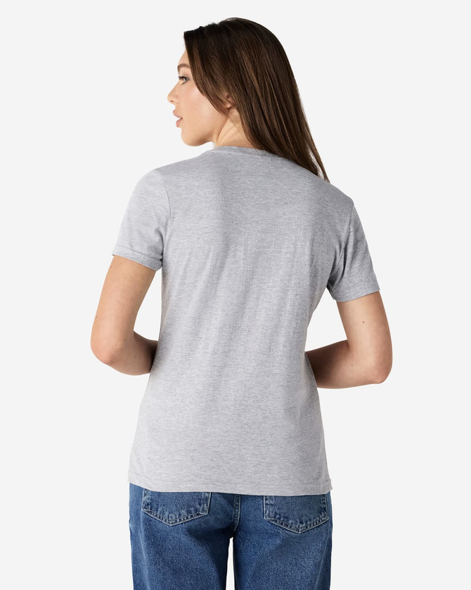 A grey ladies' V-neck t-shirt with a fitted style, viewed from the back, paired with blue jeans.