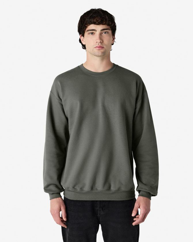 A green sweatshirt is displayed, featuring a classic crew neck and ribbed cuffs, with a logo on the front.