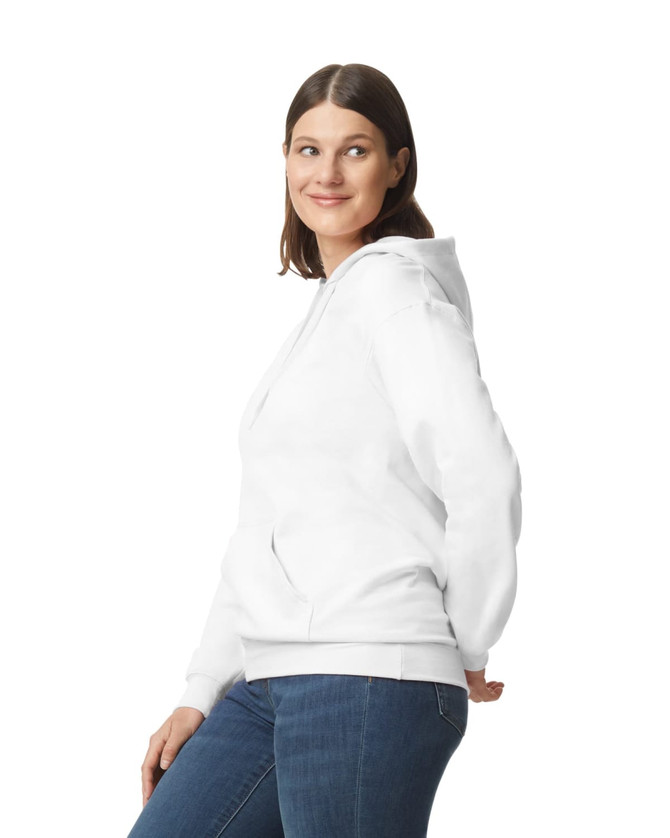 A white hooded sweatshirt with a relaxed fit, featuring a front pocket and a hood. The model is smiling and wearing denim jeans.