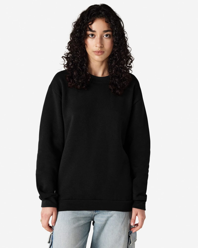 A unisex crewneck sweatshirt in black, featuring long sleeves and a relaxed fit. The garment has a logo present.