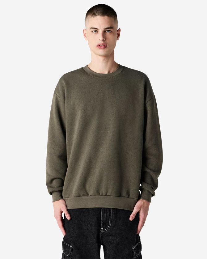 A unisex crewneck sweatshirt in olive green with long sleeves and a relaxed fit, featuring a logo.