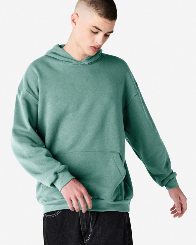 A unisex hooded sweatshirt in a soft green shade, featuring a relaxed fit and a front pocket. It has a logo.