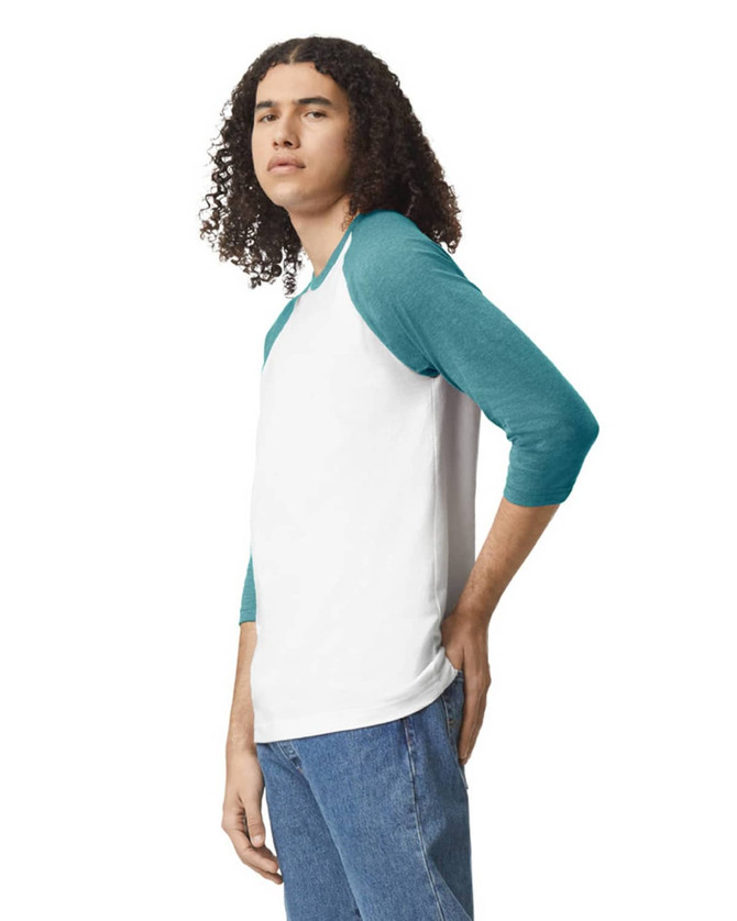 A unisex raglan T-shirt featuring a white body with teal three-quarter sleeves, showcasing a branding logo.