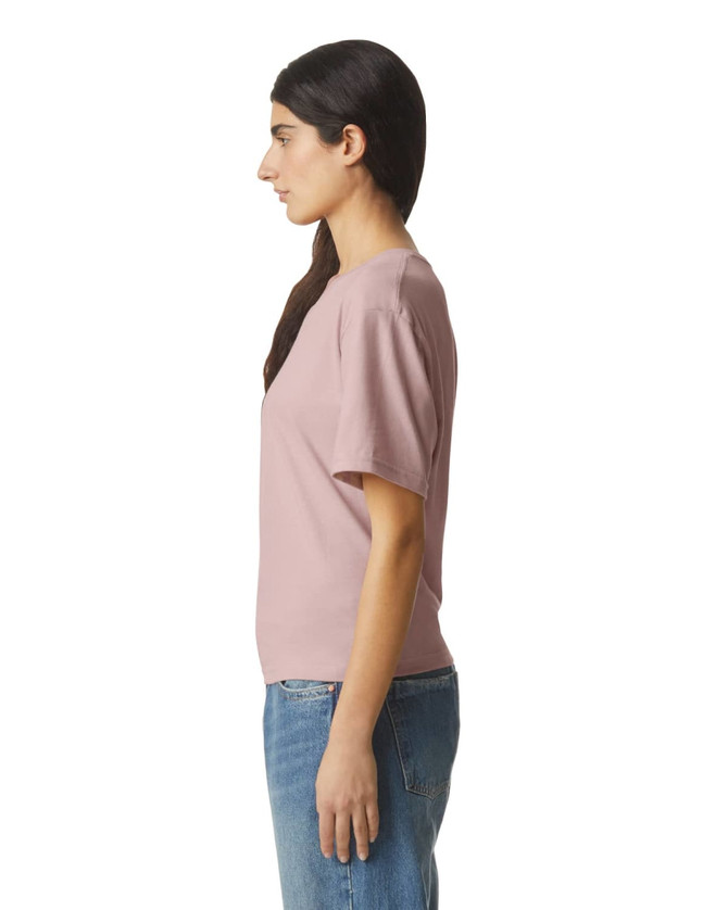 A unisex V-neck T-shirt in a soft pink colour, displayed from the side with a subtle logo.