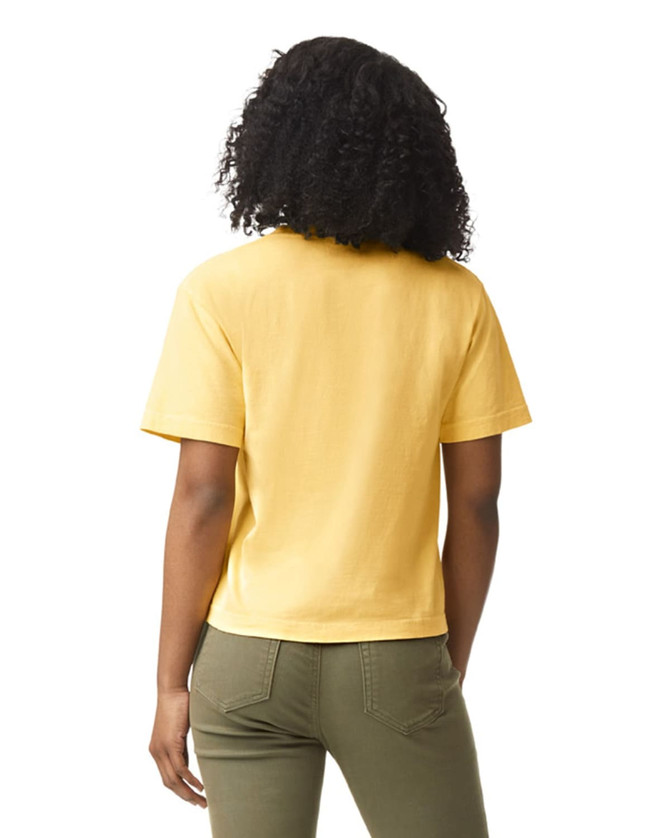 A yellow heavyweight boxy t-shirt viewed from the back, featuring short sleeves and a logo on the garment.