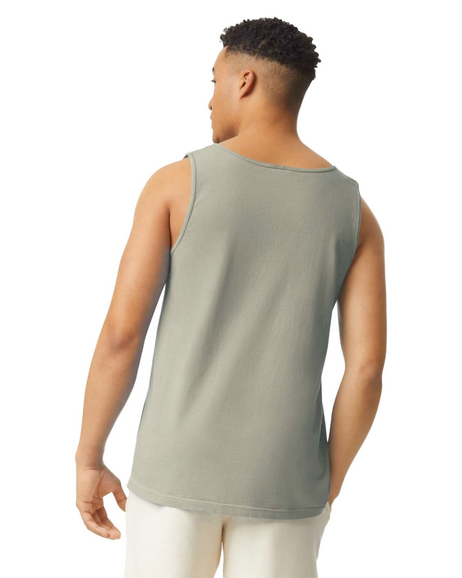 A man wearing a grey adult tank top, showcasing a simple, casual design with no visible logos.