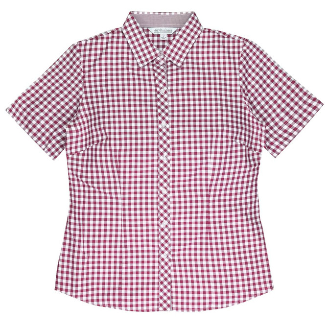 Short-sleeved button-up shirt in a maroon and white checkered pattern, featuring a branded label.