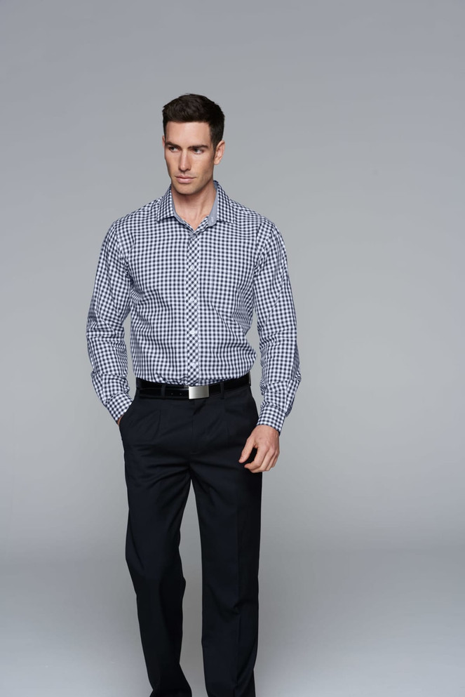 A long-sleeve button-up shirt featuring a black and white check pattern, modelled by a man, with a belt and trousers.