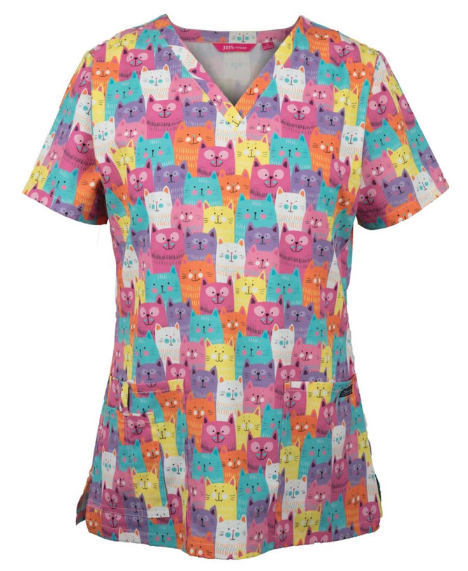 A printed scrub top featuring a vibrant pattern of colourful cats in shades of pink, purple, orange, and yellow.