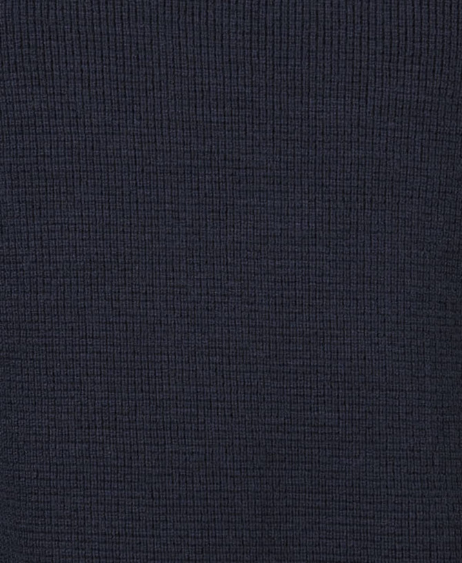 A navy blue chunky knitted jumper featuring ribbed texture and a crew neck design. It includes a logo.