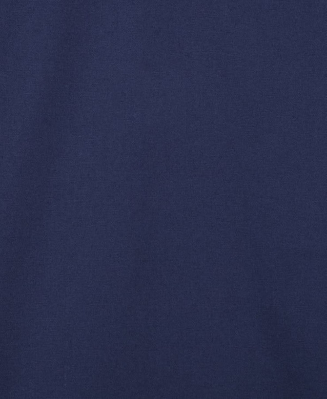 A close-up view of a navy fabric, showcasing a smooth texture suitable for work shirts.