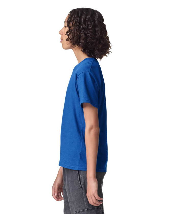 A side view of a blue youth T-shirt, featuring short sleeves and a simple design. The shirt has a logo.