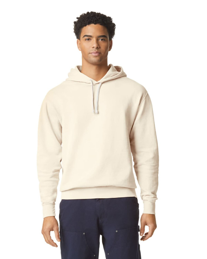 A lightweight hooded sweatshirt in beige, featuring a simple design and a logo on the front.