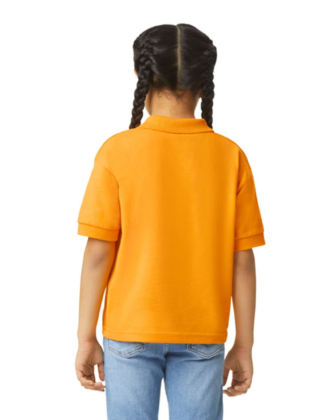 An orange Gildan youth polo shirt displayed from the back, featuring a collar and short sleeves.