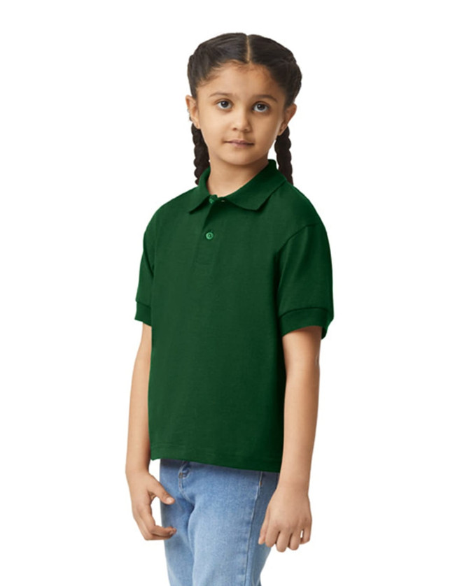 A green youth polo shirt displayed on a model with braided hair, featuring a collar and short sleeves.