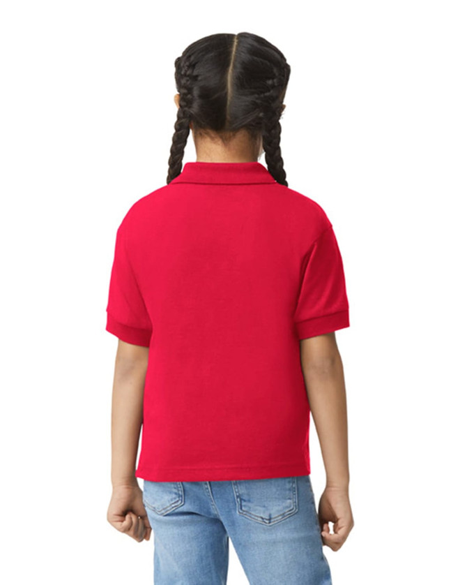 A red Gildan youth polo shirt viewed from the back, featuring short sleeves and a collar.