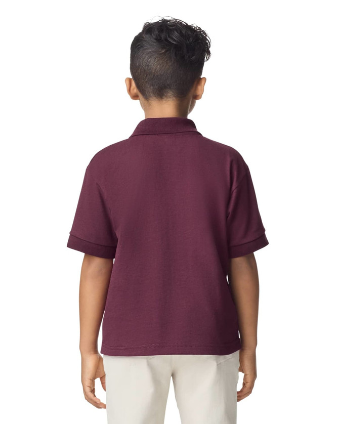 A boy wearing a maroon Gildan youth polo shirt, viewed from the back, with short sleeves and a collar.
