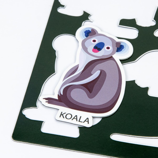 A custom die cut magnet sheet featuring a grey koala design on a dark green background, with a logo present.